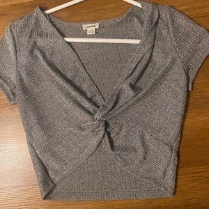 Garage front cross crop tops.